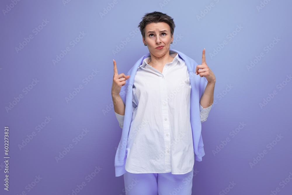 portrait of an informal young brunette woman with a short haircut in a white shirt portrait of an informal young brunette woman with a short haircut in a white shirt
