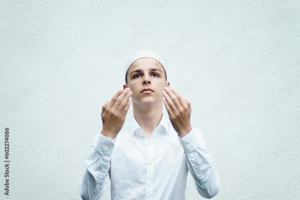 portrait of a Muslim believer isolated on a white background portrait of a Muslim believer isolated on a white background