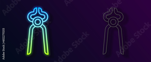 Glowing neon line Blacksmith pliers tool icon isolated on black background. Vector