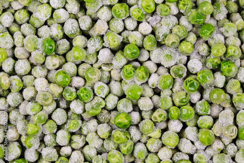 Close up of delicious frozen Green Peas with copy space