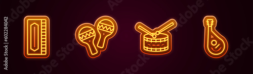 Set line Harmonica, Maracas, Drum with drum sticks and Bandura. Glowing neon icon. Vector