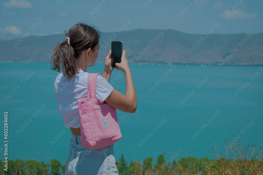 woman taking photo