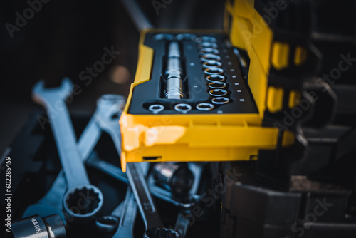 Wallpaper Mural Mechanical tools box. Worker using different repair tools for repairing and service. Tool set near the auto. Closeup. Automobile servicing and repair concept. Torontodigital.ca