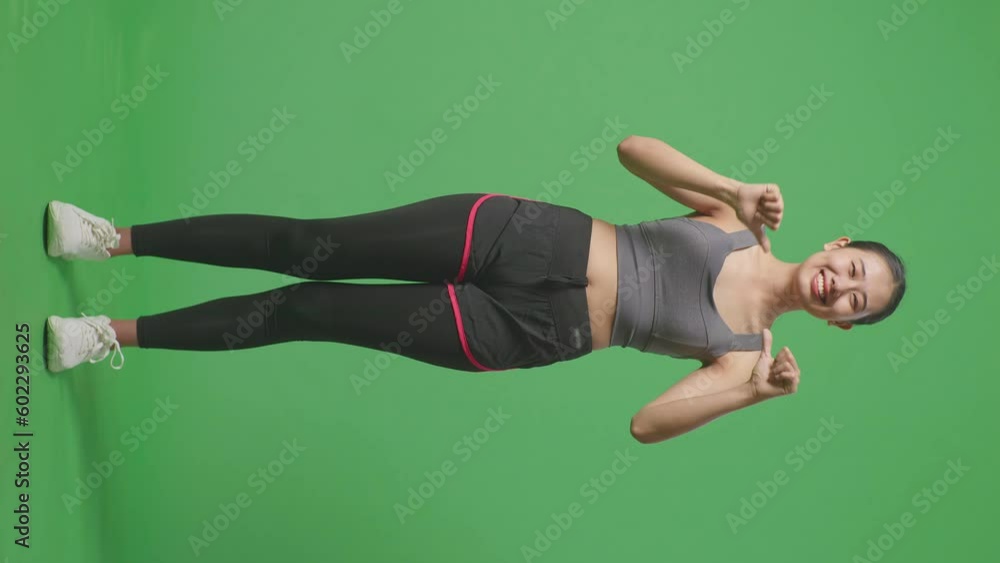 Full Body Of Asian Woman Wearing Sportswear And Smiling And Pointing Herself Being Proud On Green Screen Background In The Studio
Full Body Of Asian Woman Wearing Sportswear And Smiling And Pointing Herself Being Proud On Green Screen Background In The Studio