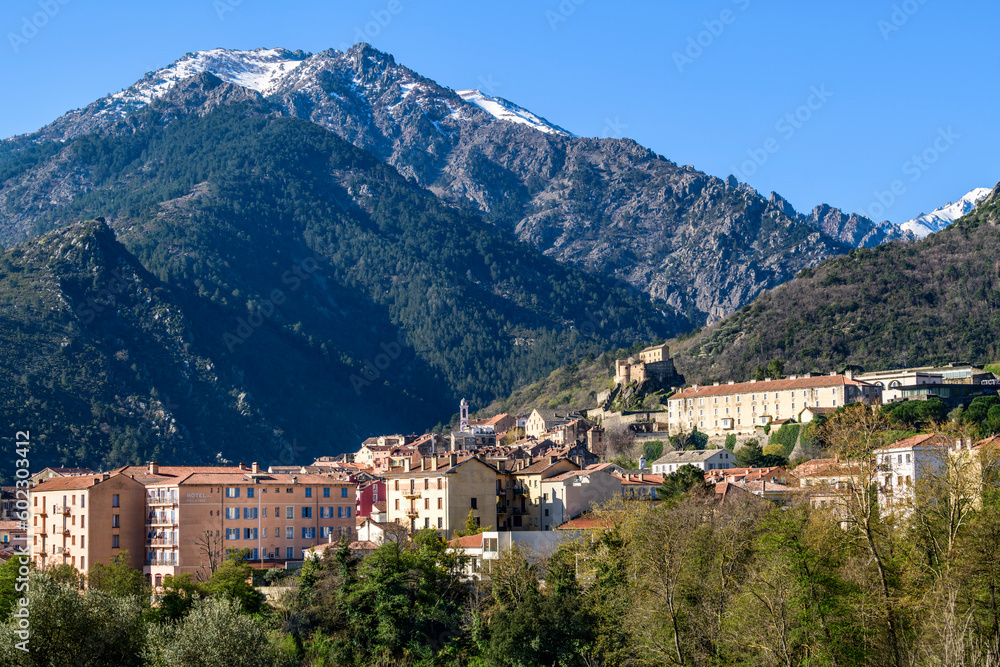 City of Corte with Citatdel and snow-capped mountains, Corsica