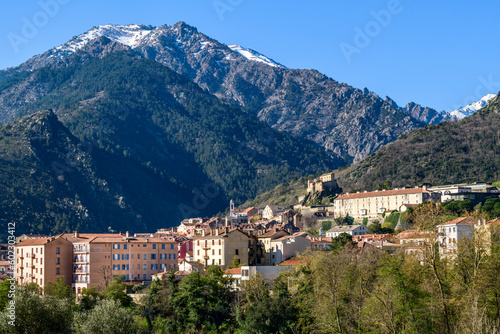City of Corte with Citatdel and snow-capped mountains, Corsica