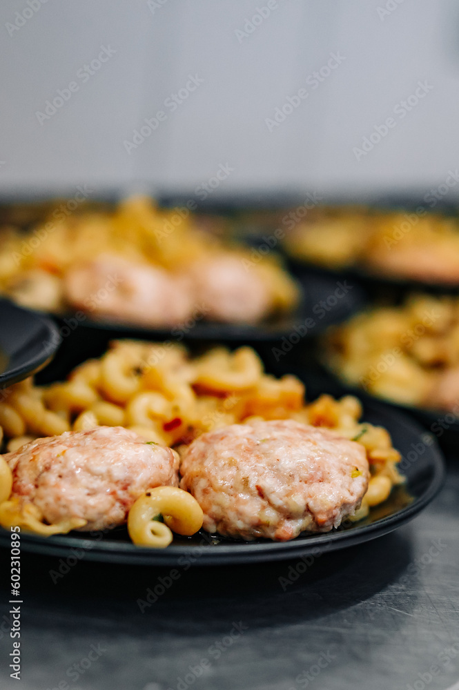 many plate with chicken meat burger cutlets with pasta many plate with chicken meat burger cutlets with pasta