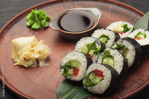 Large set of sushi with soy sauce and wasabi