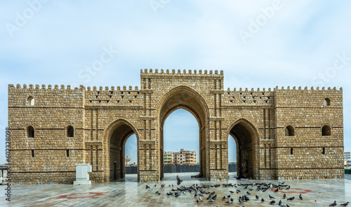 Baab Makkah, ruined fortified Mecca gate with lots of pigeons on the square, Jeddah, Saudi Arabia