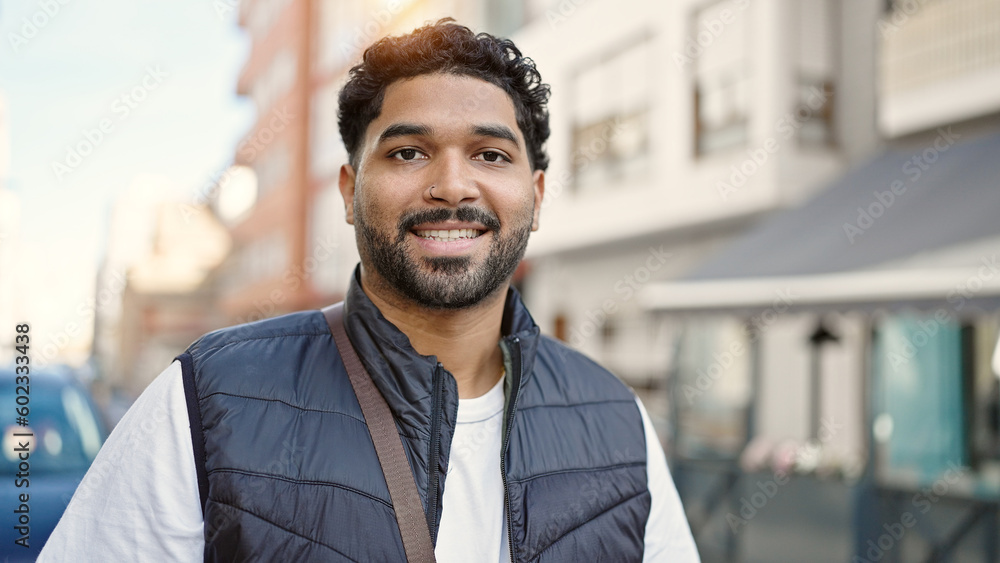 Fototapeta premium African american man smiling confident standing at street