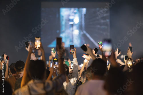 People shoot the concert on their phones © KONSTANTIN SHISHKIN