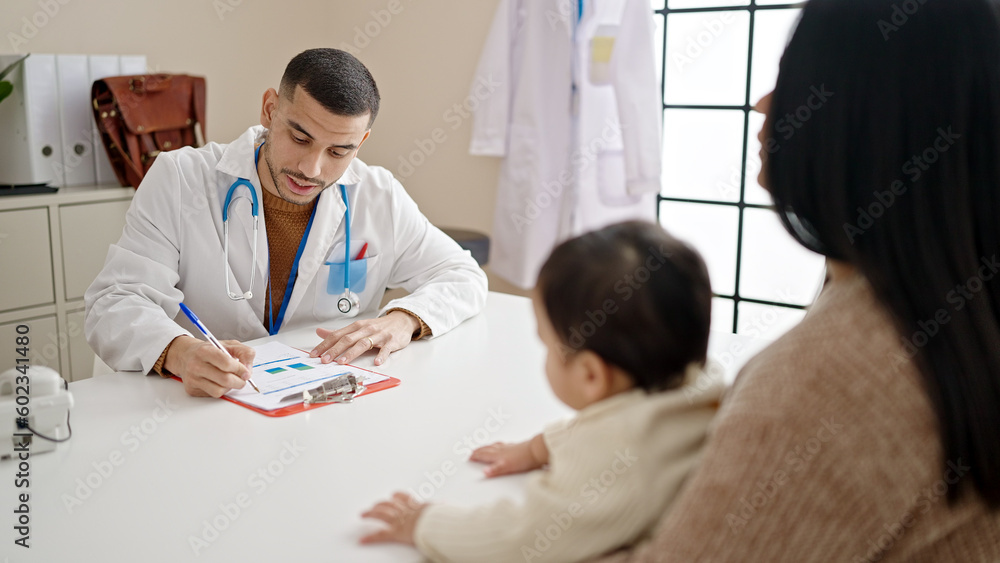 Couple and son having medical consultation at clinic Couple and son having medical consultation at clinic