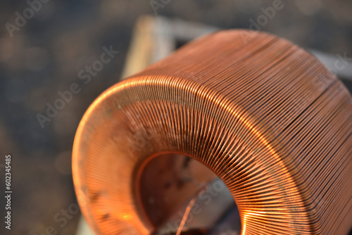 Copper coil. Copper wire wound on a coil. Copper scrap.