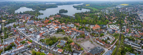 Aerial around the old town of the city Eutin on a sunny spring day