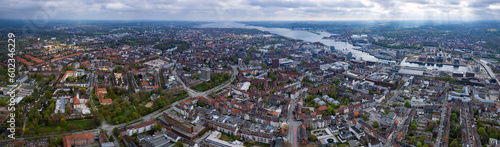 Aerial around the old town of the city Kiel on a sunny spring day