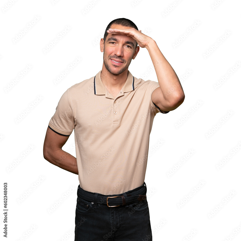 Fototapeta premium Happy young man with a gesture of looking away