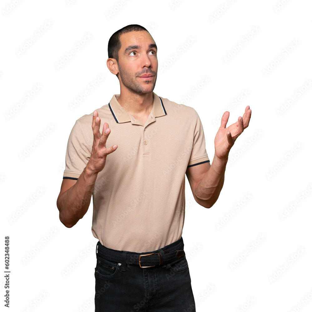 Fototapeta premium Happy young man looking up gesture