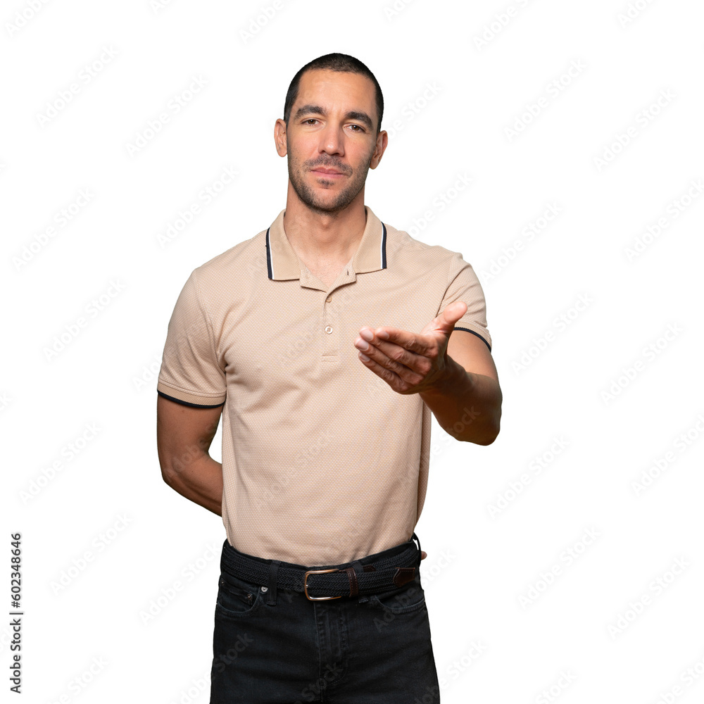 Fototapeta premium Young man waving with his hand