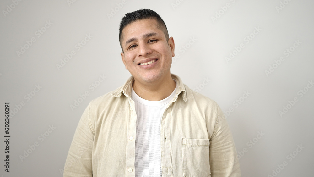 Young hispanic man smiling confident standing over isolated white background Young hispanic man smiling confident standing over isolated white background