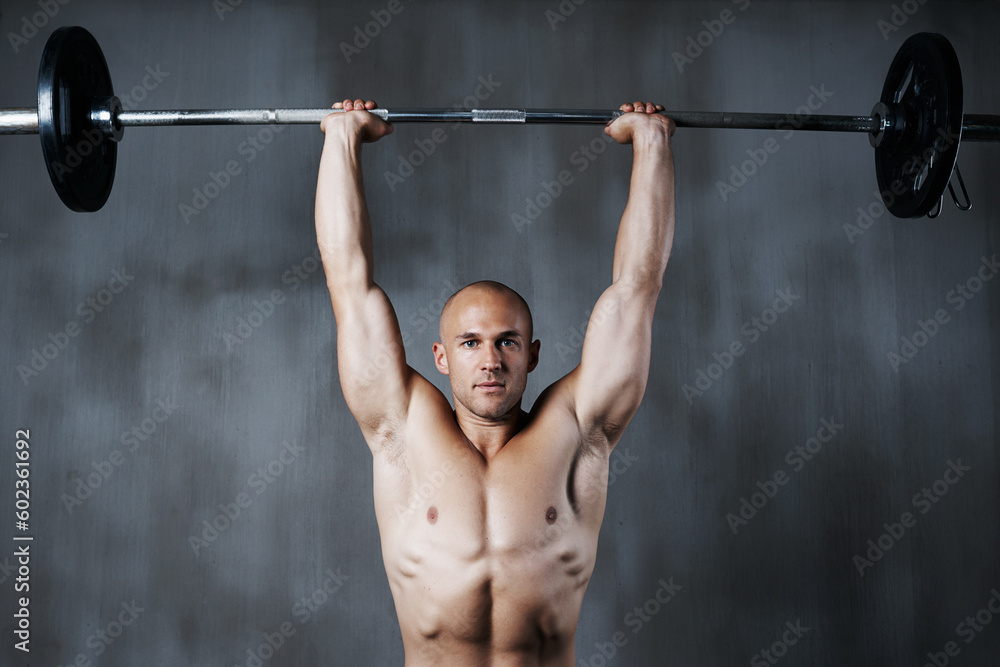 Naklejka premium Fitness, portrait man and weightlifting with barbell for arm workout, bodybuilding or exercise at gym. Fit, active and strong muscular bodybuilder male lifting weight for intense strength or training