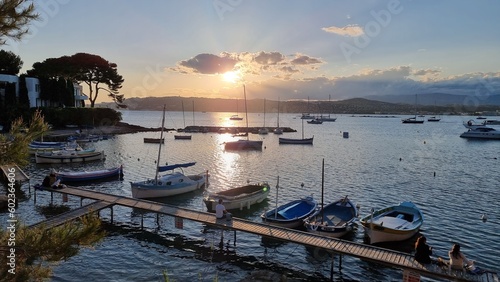 A bunch of boats in a peaceful sunset near Antibes, French Riviera