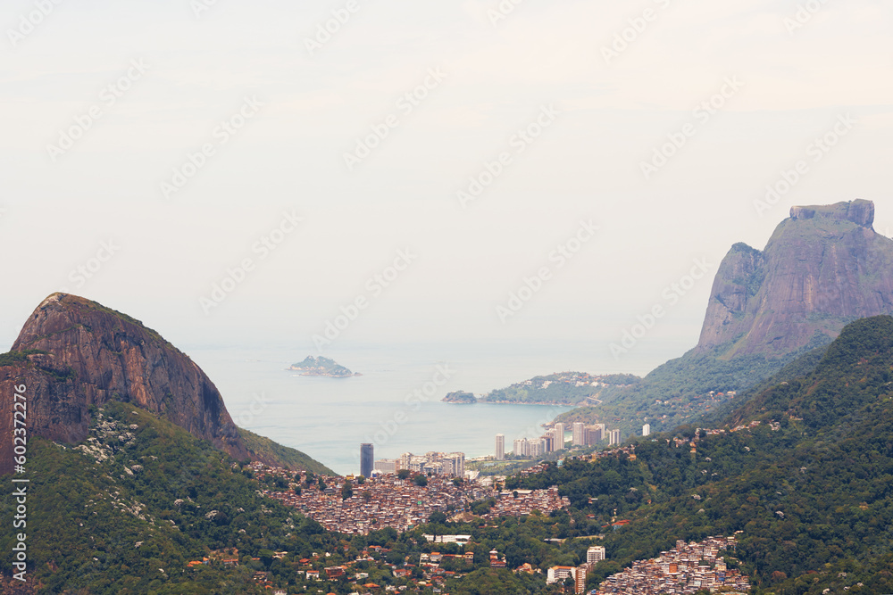 Brazil, landscape and aerial of city in mountain for traveling destination, holiday and global vacation. Travel, Rio de Janeiro and view of cityscape by ocean for tourism, sightseeing and background