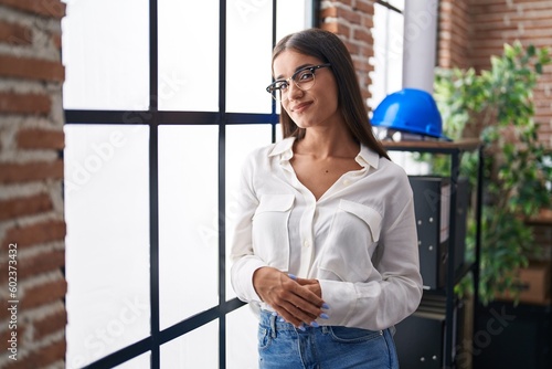 Young beautiful hispanic woman business worker smiling confident standing at office