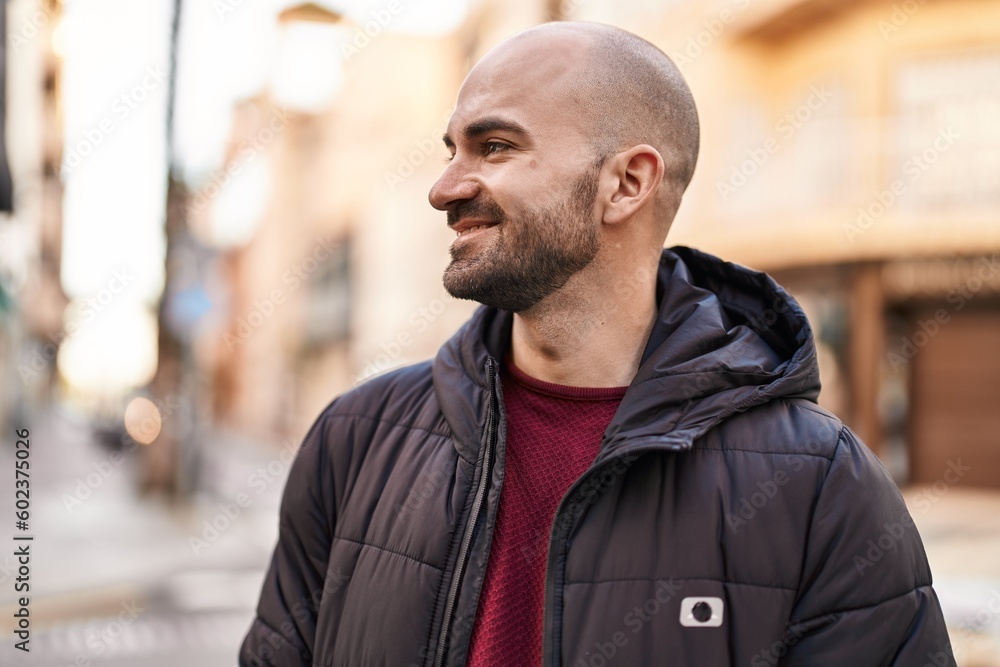 Young man smiling confident standing at street Young man smiling confident standing at street