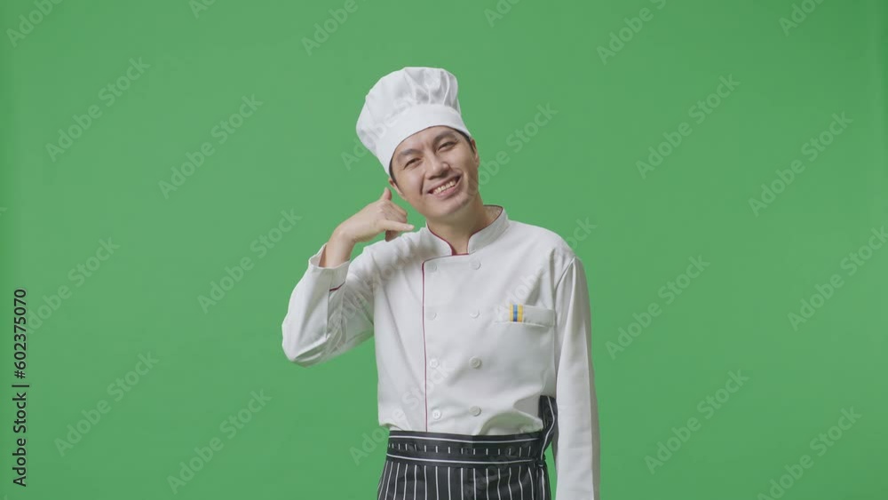 Asian Man Chef Smiling And Making Call Me Gesture To Camera While Standing In The Green Screen Background Studio
Asian Man Chef Smiling And Making Call Me Gesture To Camera While Standing In The Green Screen Background Studio