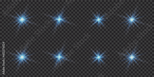 A set of flashes, lights and sparkles on a transparent background. Bright blue flashes and glare. Abstract blue isolated lights Bright rays of light. Glowing lines.