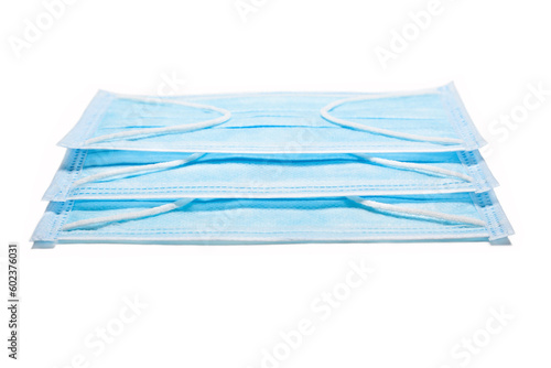 Medical protective masks in blue color isolated on white