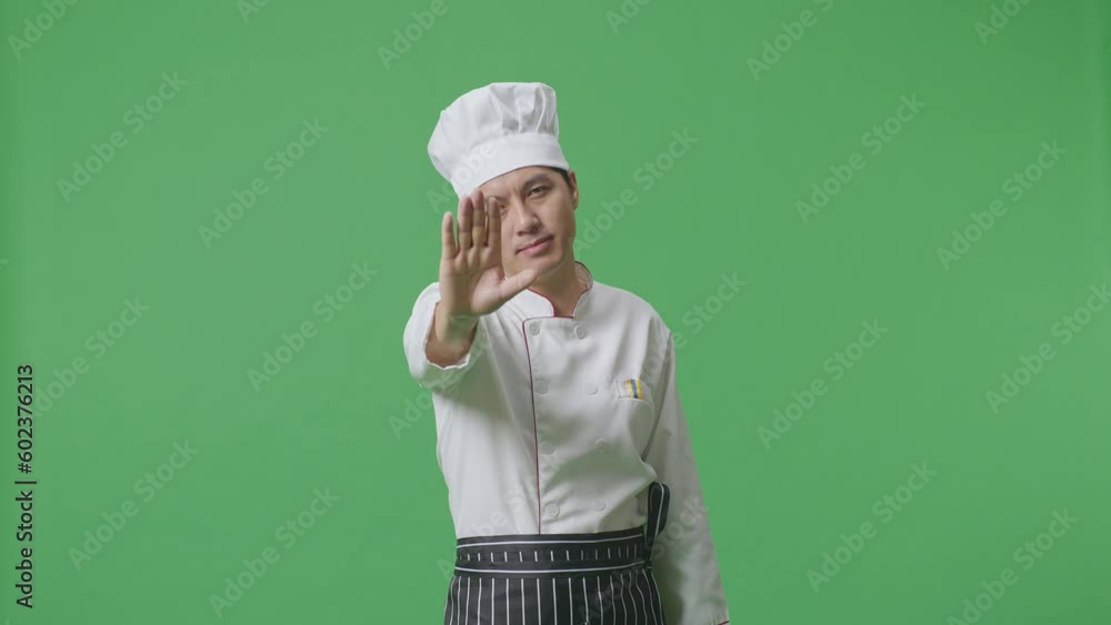 Asian Man Chef Looking At Camera And Disapproving With No Hand Sign In The Green Screen Background Studio
Asian Man Chef Looking At Camera And Disapproving With No Hand Sign In The Green Screen Background Studio