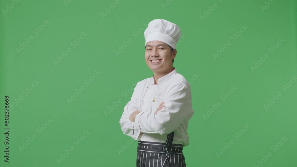 Side View Of Asian Man Chef Smiling And Crossing His Arms To Camera While Standing In The Green Screen Background Studio
Side View Of Asian Man Chef Smiling And Crossing His Arms To Camera While Standing In The Green Screen Background Studio