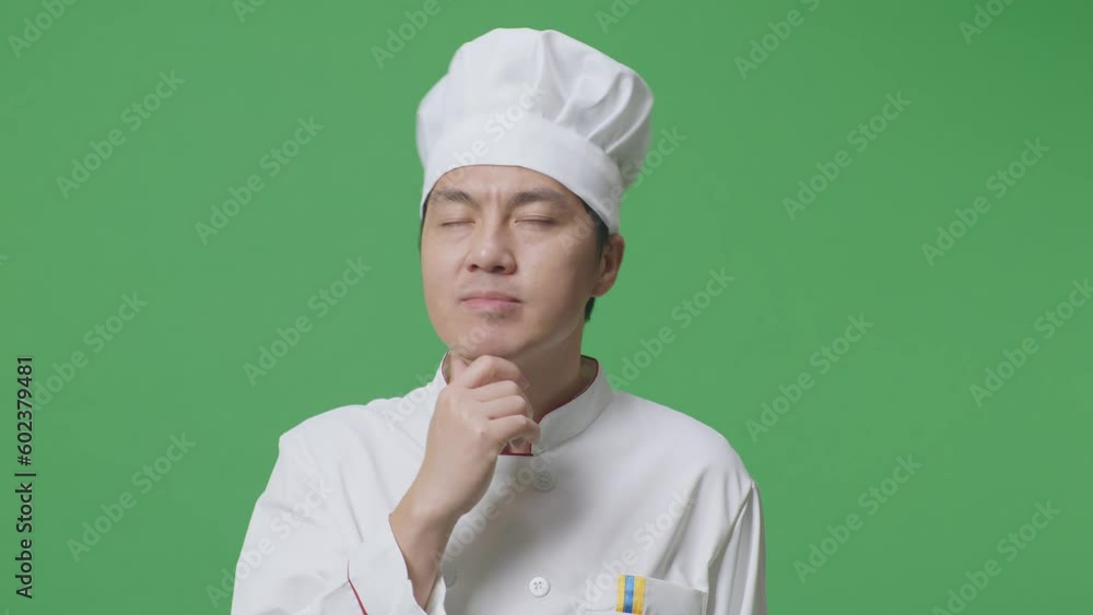 Close Up Of Asian Man Chef Thinking And Looking Around Then Raising His Index Finger While Standing In The Green Screen Background Studio
Close Up Of Asian Man Chef Thinking And Looking Around Then Raising His Index Finger While Standing In The Green Screen Background Studio
