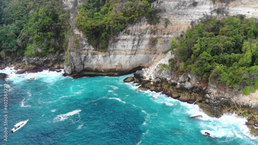 drone fly over ocean with green cliffs drone fly over ocean with green cliffs
