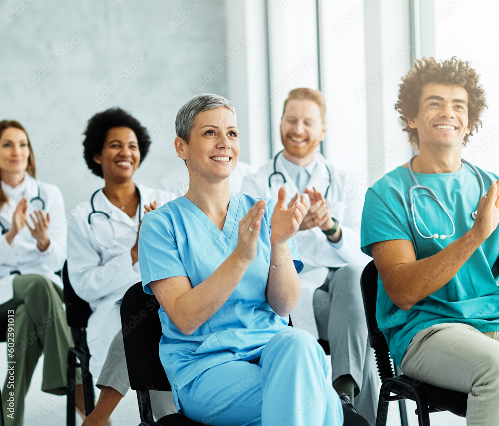 Fototapeta premium seminar business meeting doctor conference audience presentation education lecture hospital event training clapping applauding happy smiling group convention congress speech student