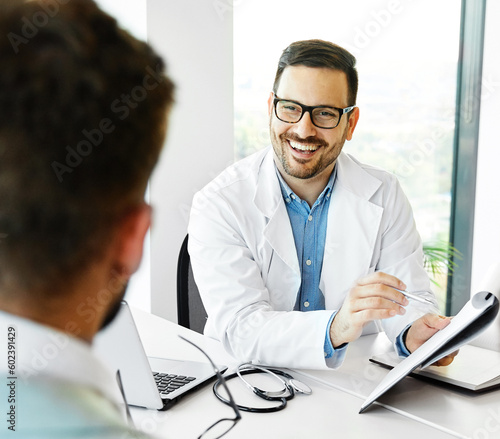 doctor patient hospital care medical medicine man health clinic portrait discussion office professional indoor explaining visit expertise physician listening talking occupation practitioner