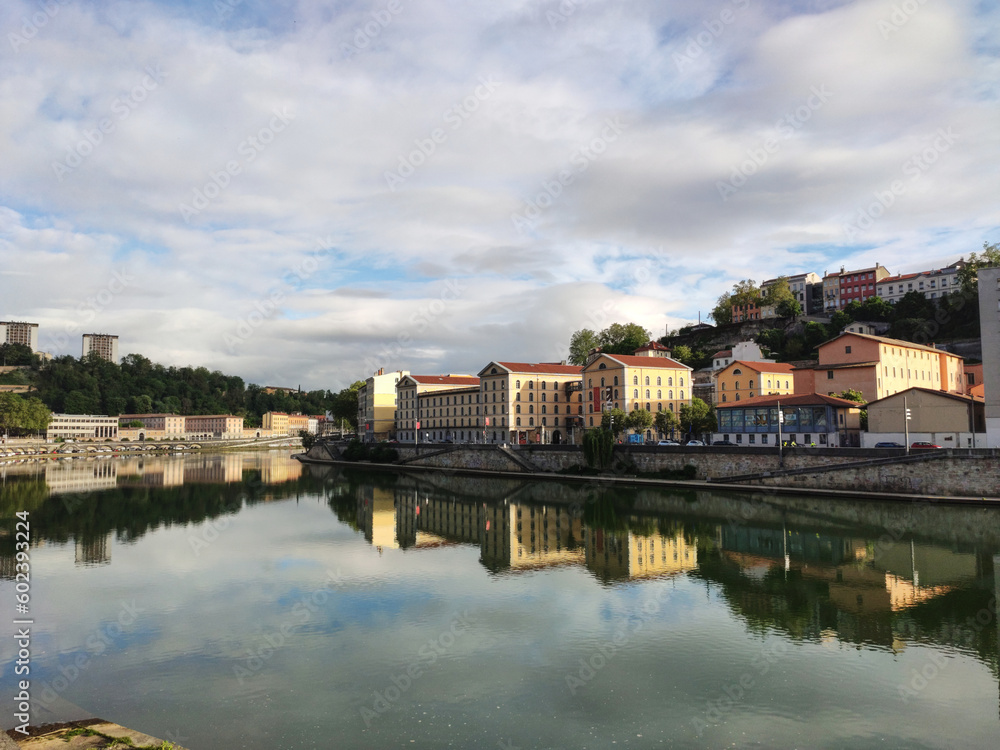 Morning light and reflections on Saone river, quay Saint Vincent, and 