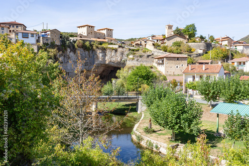 a view of Puentedey village over the natural bridge on the Nela river, Merindad de Valdeporres, province of Burgos, Castile and León, Spain