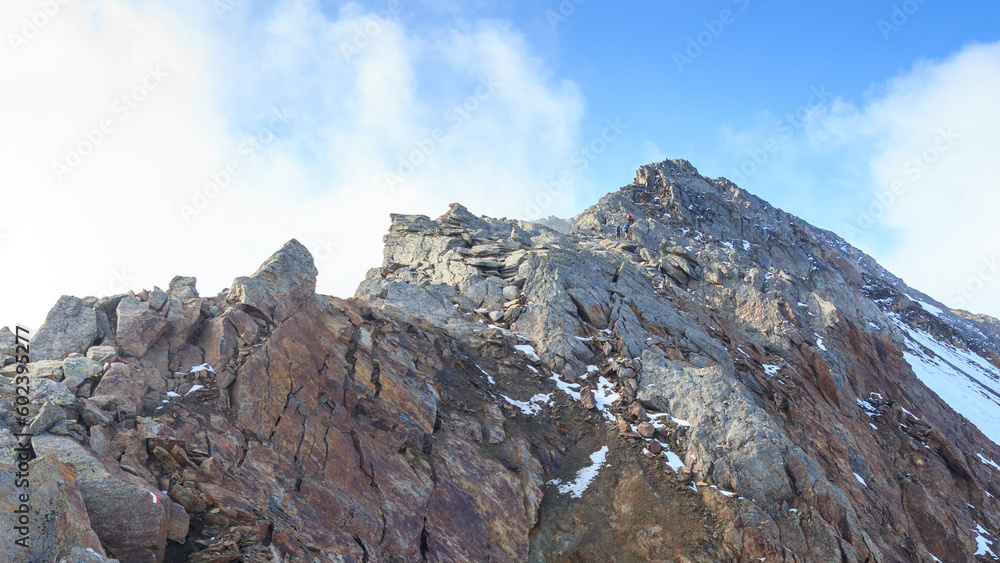 Ridge of rock towards mountain summit Hasenöhrl in the Ortler Alps, South Tyrol, Italy Ridge of rock towards mountain summit Hasenöhrl in the Ortler Alps, South Tyrol, Italy