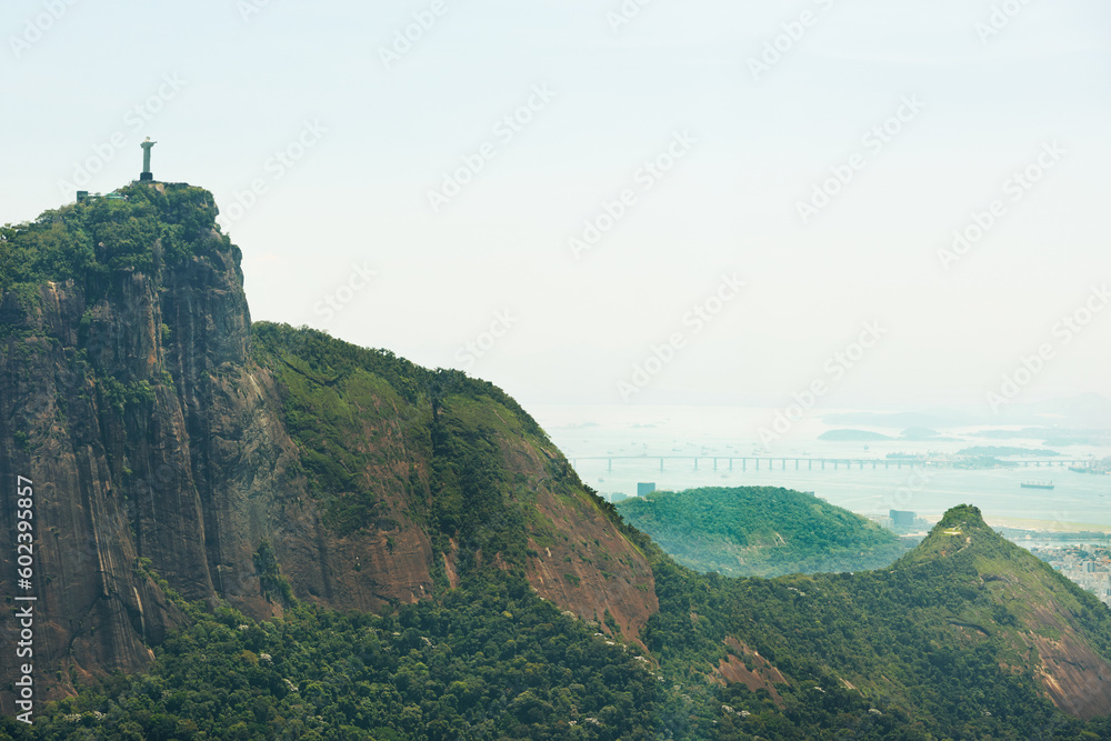 Mountain, nature and Christ the Redeemer in Brazil for tourism, sightseeing and travel destination. Landscape, Rio de Janeiro and drone view of statue, sculpture and landmark on hill background