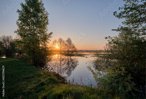 Fototapeta Naklejka Na Ścianę i Meble -  Sunrise on the pouring field