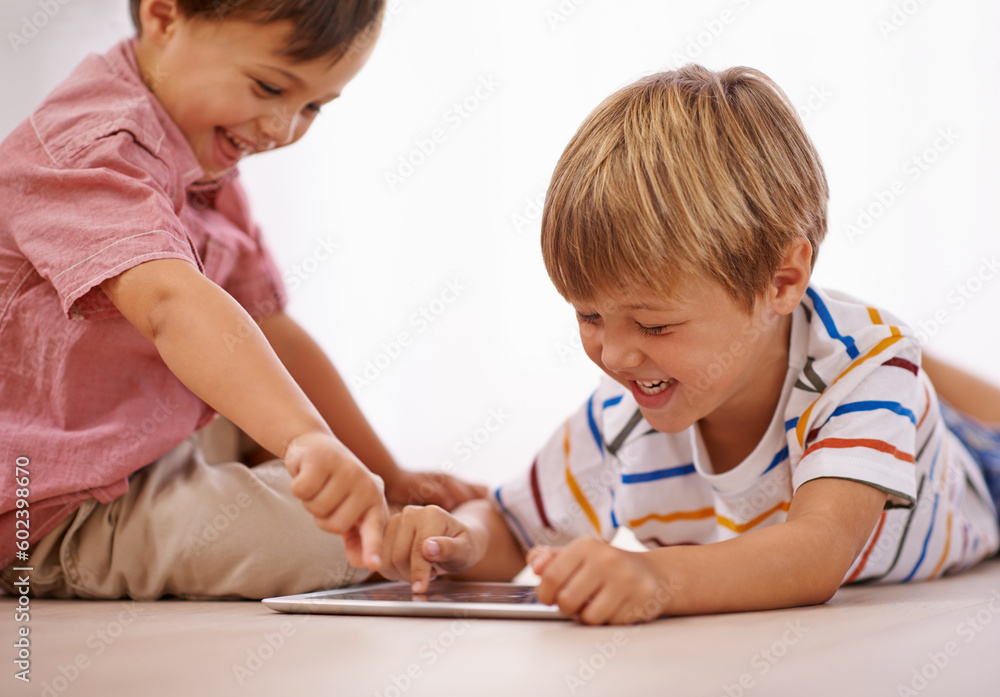 Children, playing and tablet for learning and education in family home for happiness and fun. Male kids or friends together for play, laughing and streaming on internet for development with app video