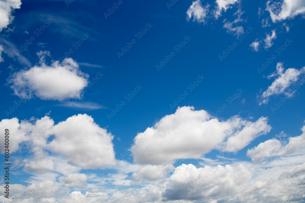 Deep blue skies with white clouds background Deep blue skies with white clouds background