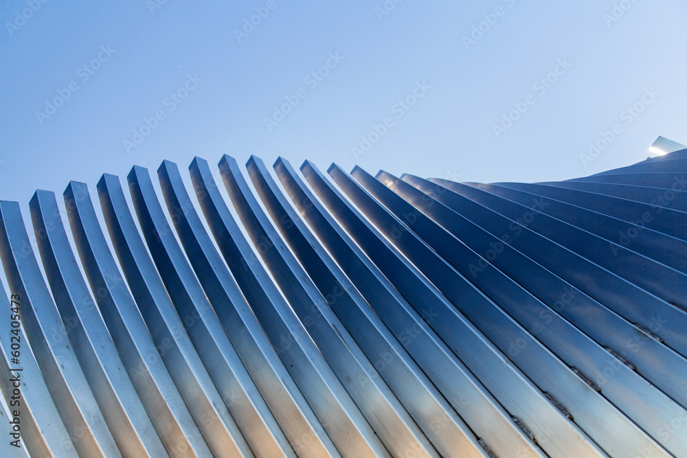 architecture and site concept - close up of modern building construction part over blue sky