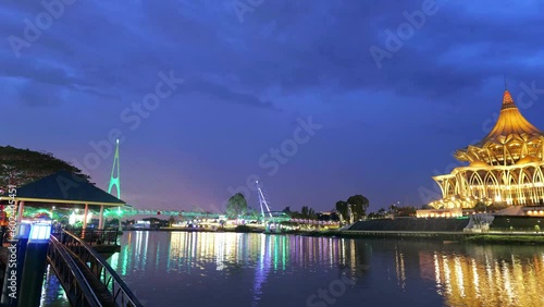 Kuching timelapse at sunset With River And Landmarks In Sarawak, Malaysia photo