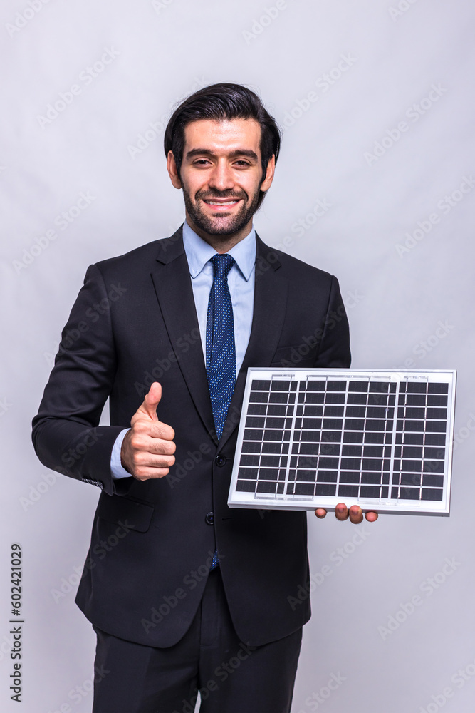 Businessman holding solar cell panel. Smiling male engineer holding a photovoltaic solar panel isolated on white background. People Discussing Solar Power Environment