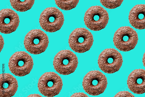 chocolate donuts on bright blue background big size
