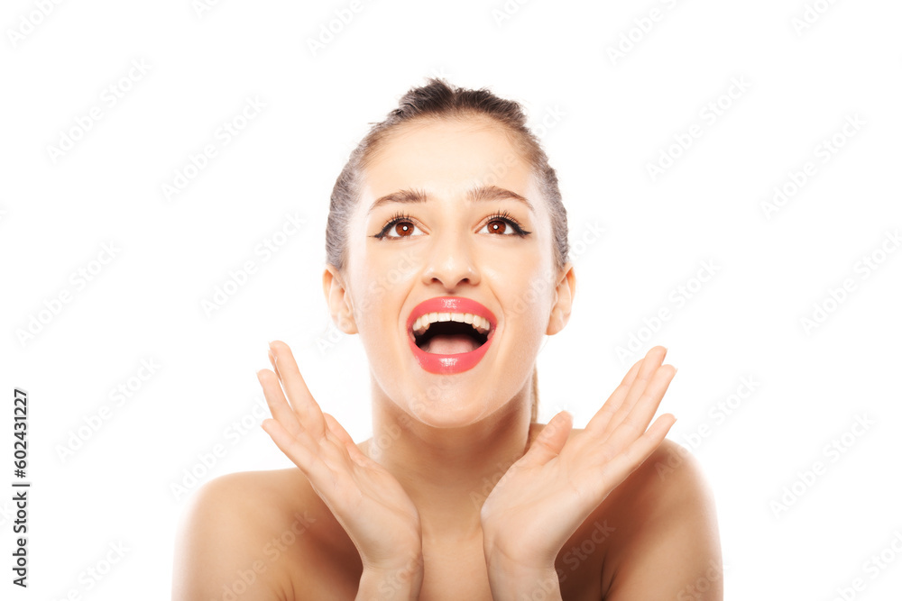 Beautiful girl studio portrait. Making hand gestures and face expressions against white background. Beautiful girl studio portrait. Making hand gestures and face expressions against white background.