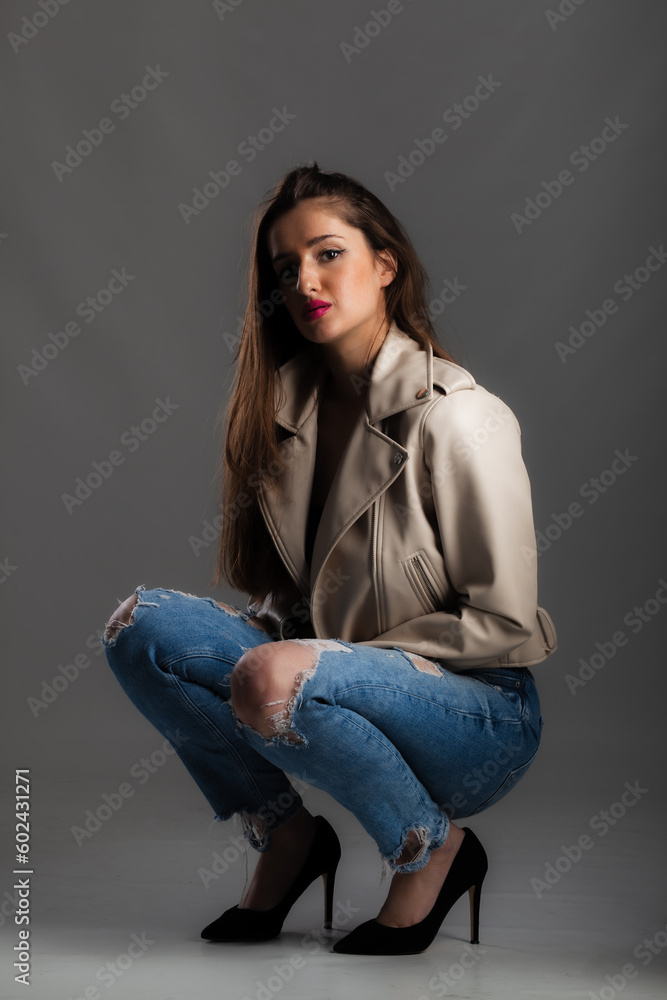 full body poirtrait of a beautiful girl with long hair wearing jeans and jacket full body poirtrait of a beautiful girl with long hair wearing jeans and jacket